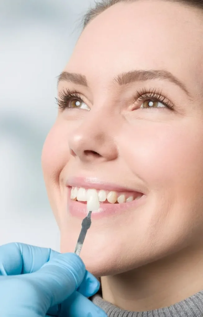 Woman getting a tooth veneer