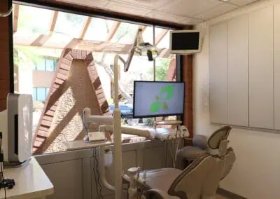 A dental chair in one of the patient rooms