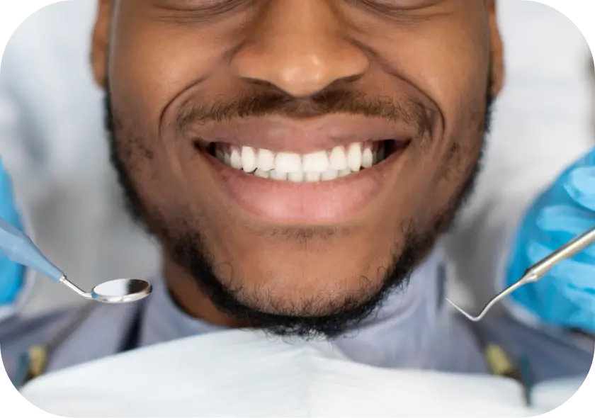 Smiling male dental patient